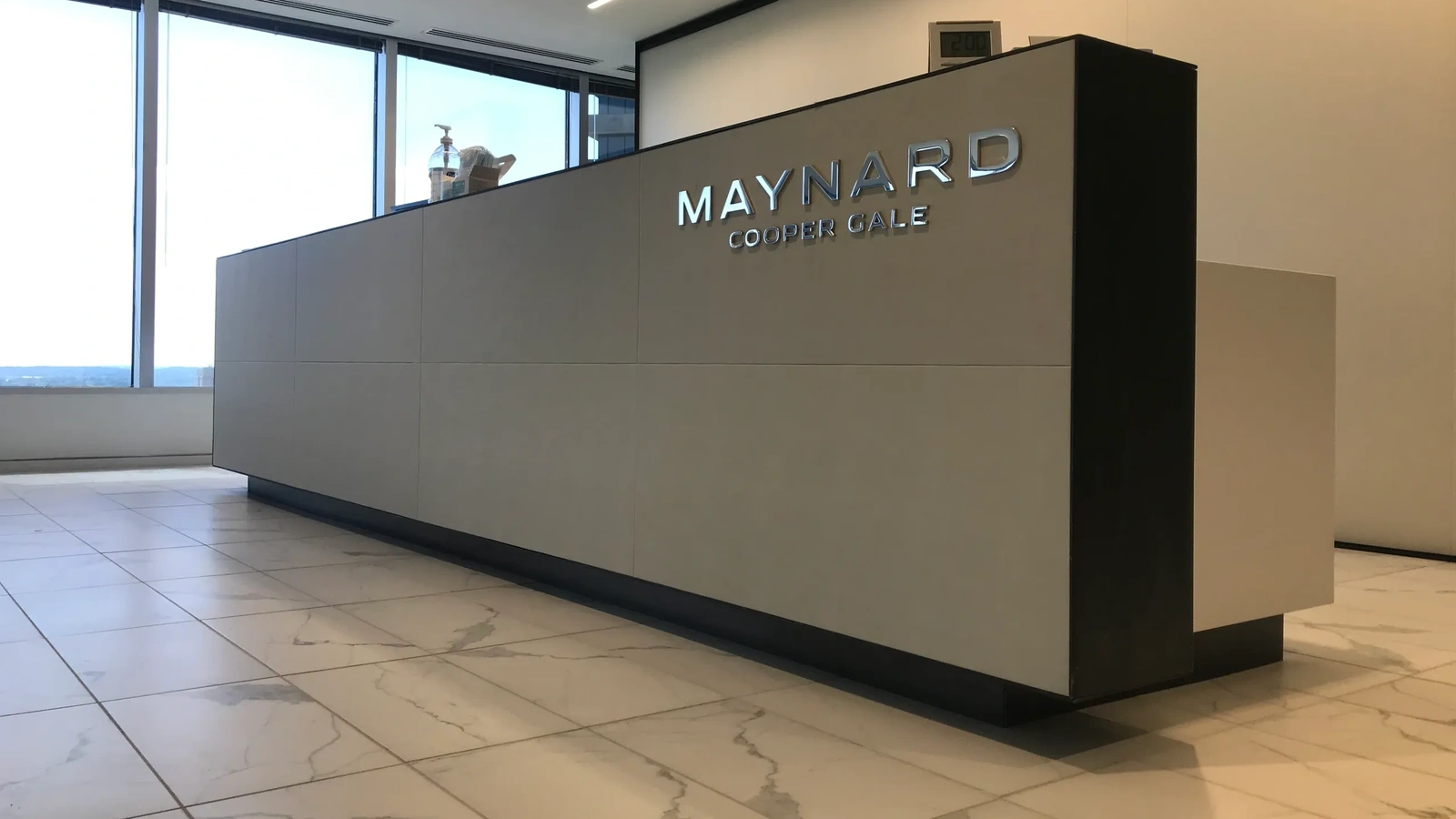 commercial-custom-metal-reception-desk-law-office-site-16x9-1.webp