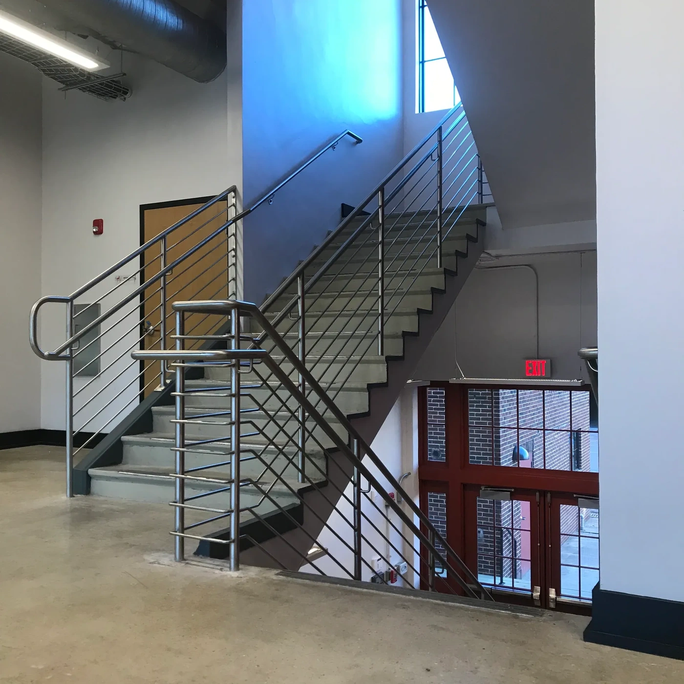 commercial-metal-stair-railing-interior-cropb-1x1-1.webp