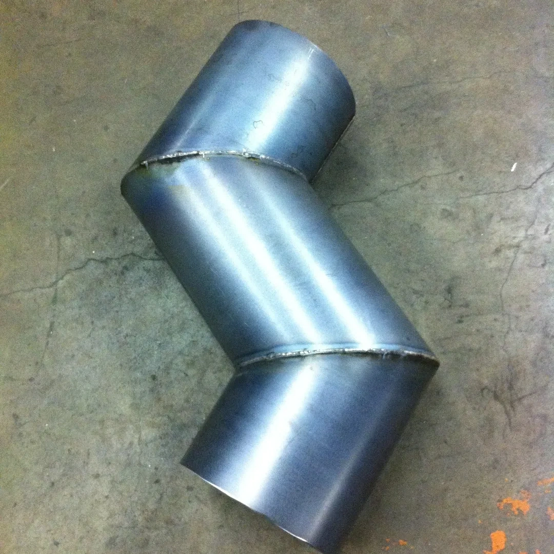 industrial-fabricated-metal-duct-elbow-site-1x1-1.webp
